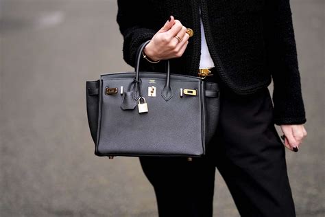 how much is a birking bag|how to carry birkin bags.